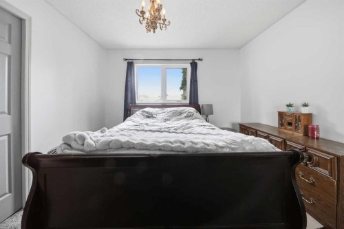 76 Dixon Crescent, Red Deer, AB - Indoor Photo Showing Bedroom