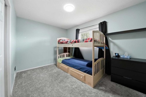 76 Dixon Crescent, Red Deer, AB - Indoor Photo Showing Bedroom