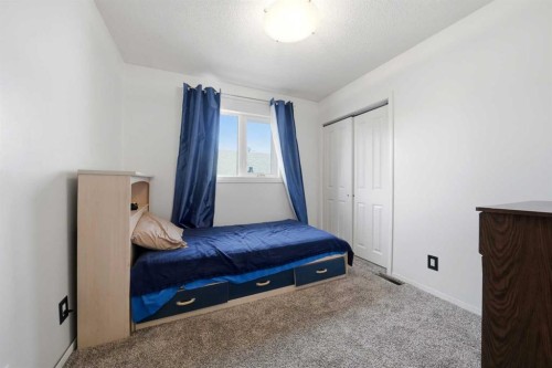 76 Dixon Crescent, Red Deer, AB - Indoor Photo Showing Bedroom