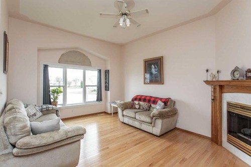14 Lincoln Park, Lacombe, AB - Indoor Photo Showing Living Room With Fireplace