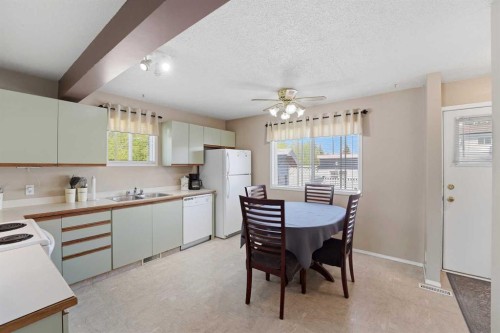 1 Greig Close, Red Deer, AB - Indoor Photo Showing Kitchen With Double Sink