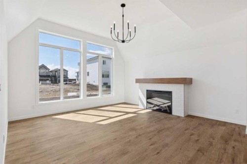 93 Bartlett Way Se, Calgary, AB - Indoor With Fireplace