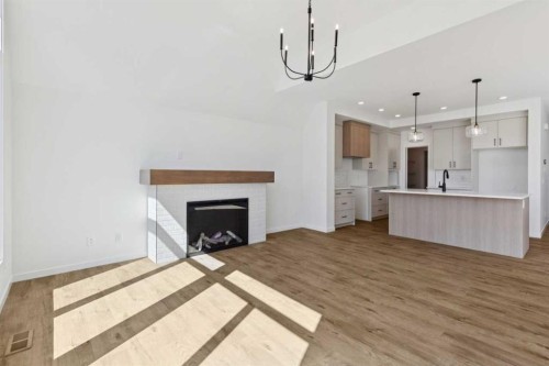 93 Bartlett Way Se, Calgary, AB - Indoor With Fireplace