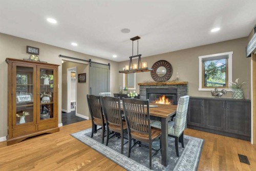 3520 44A Avenue, Red Deer, AB - Indoor Photo Showing Dining Room With Fireplace