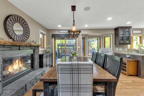 3520 44A Avenue, Red Deer, AB - Indoor Photo Showing Dining Room With Fireplace