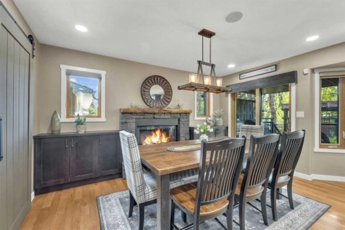 3520 44A Avenue, Red Deer, AB - Indoor Photo Showing Dining Room With Fireplace