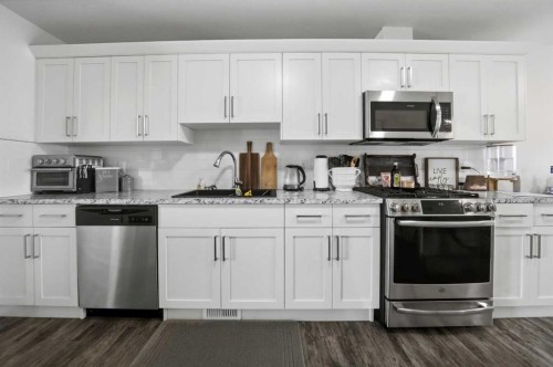 74 Ranchers Close, Lacombe, AB - Indoor Photo Showing Kitchen With Upgraded Kitchen