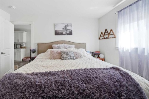 74 Ranchers Close, Lacombe, AB - Indoor Photo Showing Bedroom
