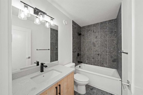 91 Heritage Manor, Cochrane, AB - Indoor Photo Showing Bathroom