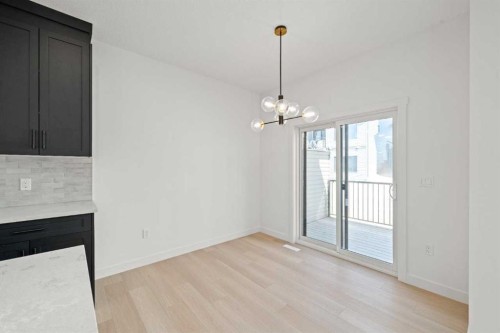 91 Heritage Manor, Cochrane, AB - Indoor Photo Showing Other Room