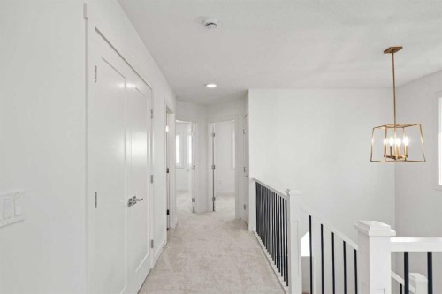 91 Heritage Manor, Cochrane, AB - Indoor Photo Showing Other Room