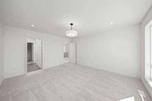 91 Heritage Manor, Cochrane, AB - Indoor Photo Showing Other Room