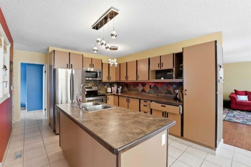 26 Gummow Close, Red Deer, AB - Indoor Photo Showing Kitchen With Double Sink