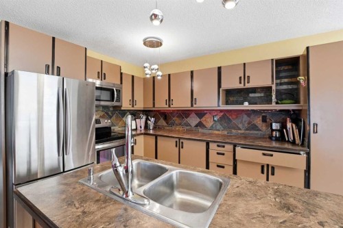 26 Gummow Close, Red Deer, AB - Indoor Photo Showing Kitchen With Stainless Steel Kitchen With Double Sink