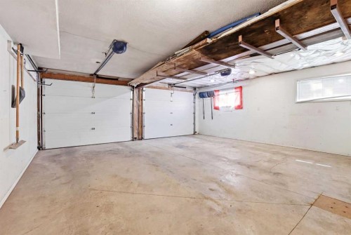 26 Gummow Close, Red Deer, AB - Indoor Photo Showing Garage