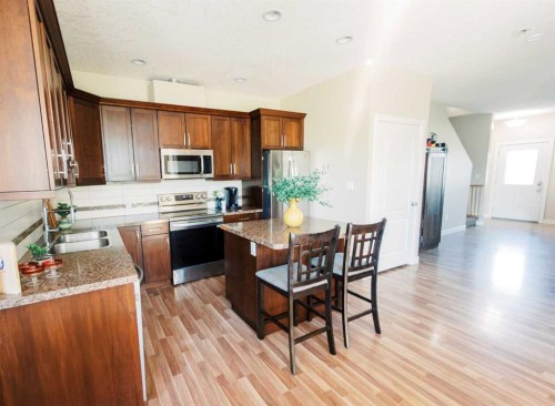 5007B 46 Street, Stettler, AB - Indoor Photo Showing Kitchen With Double Sink
