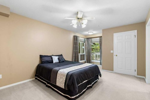 211-6118 53 Avenue, Red Deer, AB - Indoor Photo Showing Bedroom