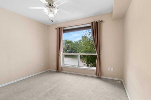 211-6118 53 Avenue, Red Deer, AB - Indoor Photo Showing Other Room