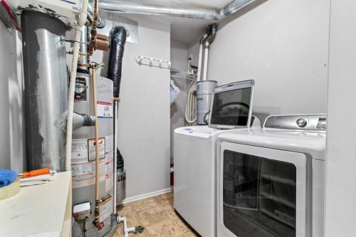 211-6118 53 Avenue, Red Deer, AB - Indoor Photo Showing Laundry Room