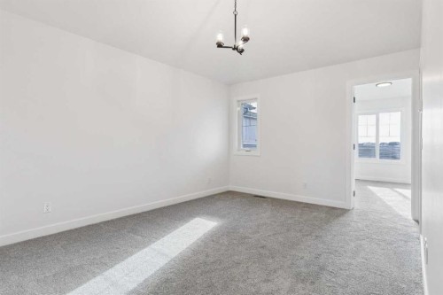 206 Sora Way Se, Calgary, AB - Indoor Photo Showing Other Room