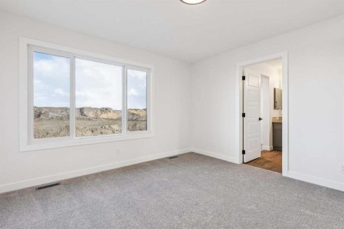 206 Sora Way Se, Calgary, AB - Indoor Photo Showing Other Room