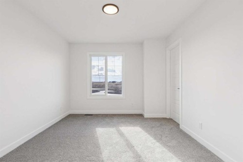 206 Sora Way Se, Calgary, AB - Indoor Photo Showing Other Room