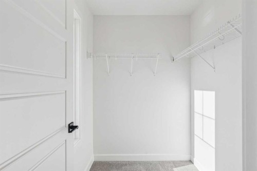 206 Sora Way Se, Calgary, AB - Indoor With Storage