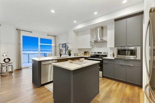206 Sora Way Se, Calgary, AB - Indoor Photo Showing Kitchen With Stainless Steel Kitchen With Upgraded Kitchen