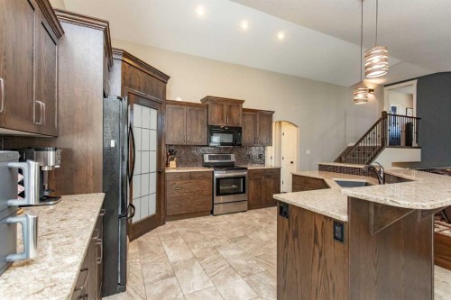 101 Coachman Way, Blackfalds, AB - Indoor Photo Showing Kitchen With Upgraded Kitchen