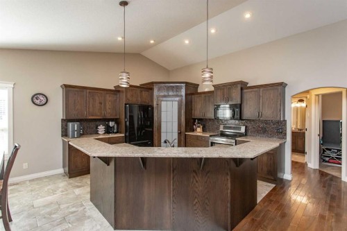 101 Coachman Way, Blackfalds, AB - Indoor Photo Showing Kitchen With Upgraded Kitchen
