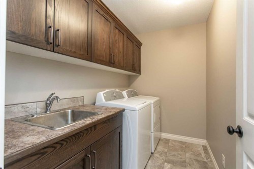 101 Coachman Way, Blackfalds, AB - Indoor Photo Showing Laundry Room
