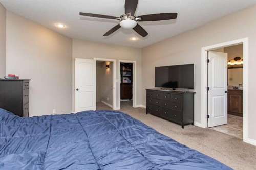 101 Coachman Way, Blackfalds, AB - Indoor Photo Showing Bedroom