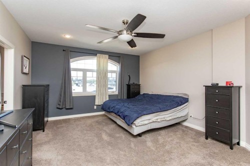 101 Coachman Way, Blackfalds, AB - Indoor Photo Showing Bedroom