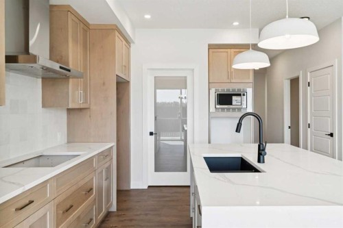 65 Sora Gardens Se, Calgary, AB - Indoor Photo Showing Kitchen