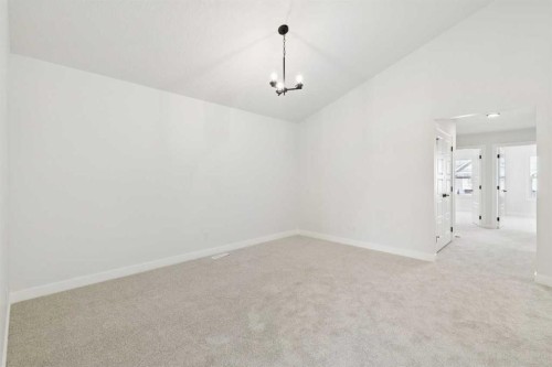 65 Sora Gardens Se, Calgary, AB - Indoor Photo Showing Other Room
