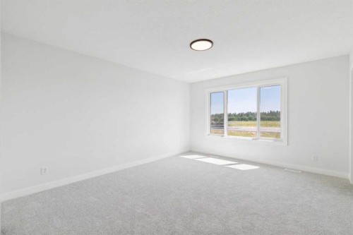 65 Sora Gardens Se, Calgary, AB - Indoor Photo Showing Other Room