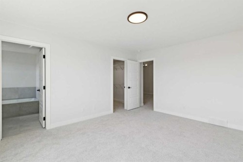 65 Sora Gardens Se, Calgary, AB - Indoor Photo Showing Other Room