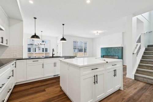 283 Dawson Wharf Rise, Chestermere, AB - Indoor Photo Showing Kitchen With Upgraded Kitchen