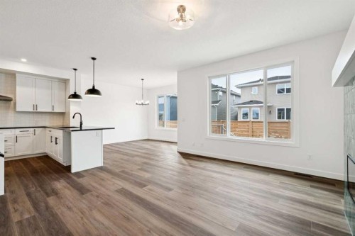 283 Dawson Wharf Rise, Chestermere, AB - Indoor Photo Showing Kitchen With Upgraded Kitchen