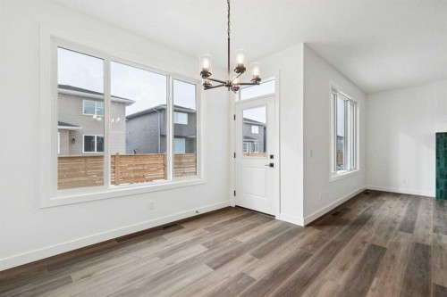 283 Dawson Wharf Rise, Chestermere, AB - Indoor With Fireplace