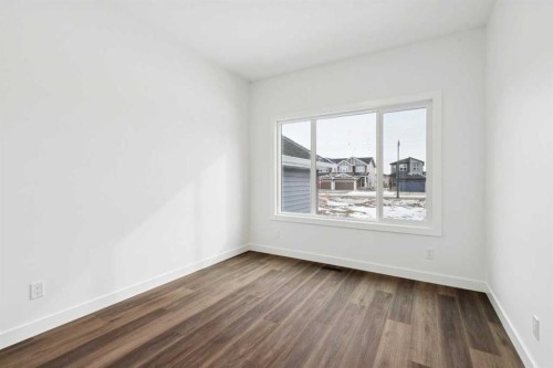 283 Dawson Wharf Rise, Chestermere, AB - Indoor Photo Showing Other Room