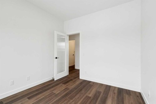 283 Dawson Wharf Rise, Chestermere, AB - Indoor Photo Showing Other Room