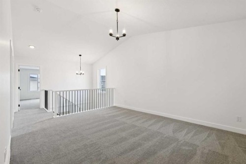 283 Dawson Wharf Rise, Chestermere, AB - Indoor Photo Showing Other Room