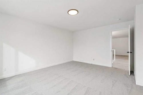 283 Dawson Wharf Rise, Chestermere, AB - Indoor Photo Showing Other Room