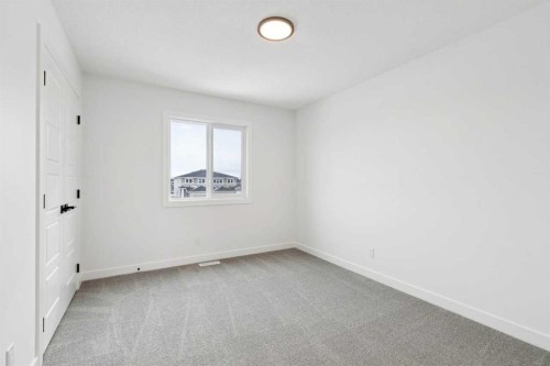 283 Dawson Wharf Rise, Chestermere, AB - Indoor Photo Showing Other Room