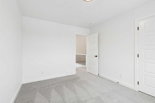 283 Dawson Wharf Rise, Chestermere, AB - Indoor Photo Showing Other Room