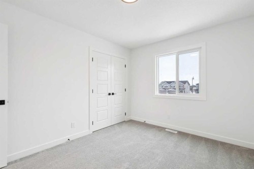 283 Dawson Wharf Rise, Chestermere, AB - Indoor Photo Showing Other Room
