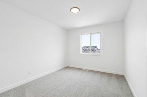 283 Dawson Wharf Rise, Chestermere, AB - Indoor Photo Showing Other Room