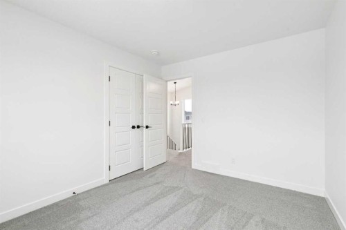 283 Dawson Wharf Rise, Chestermere, AB - Indoor Photo Showing Other Room