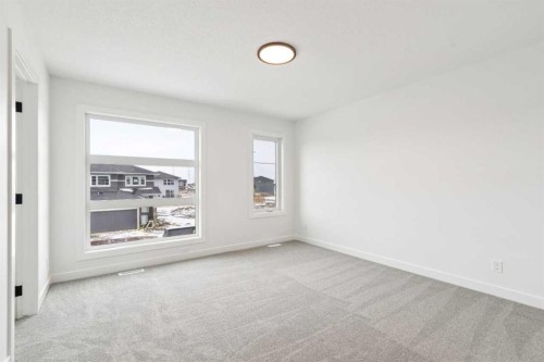 283 Dawson Wharf Rise, Chestermere, AB - Indoor Photo Showing Other Room